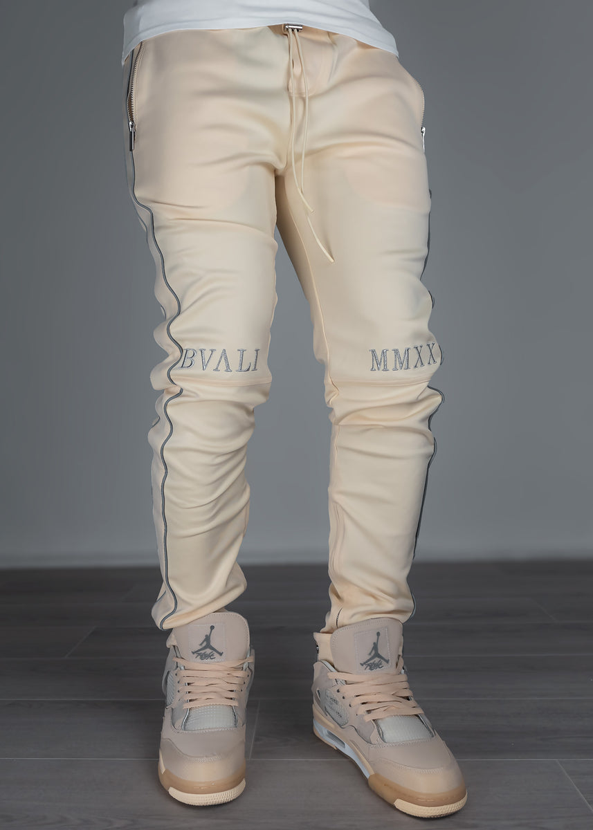 Cream track pants hot sale